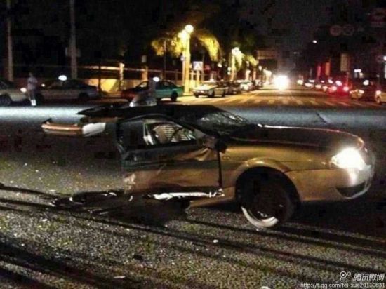 東莞車禍:2013年7月4日凌晨,一輛出租車被寶馬車折腰撞成兩截。